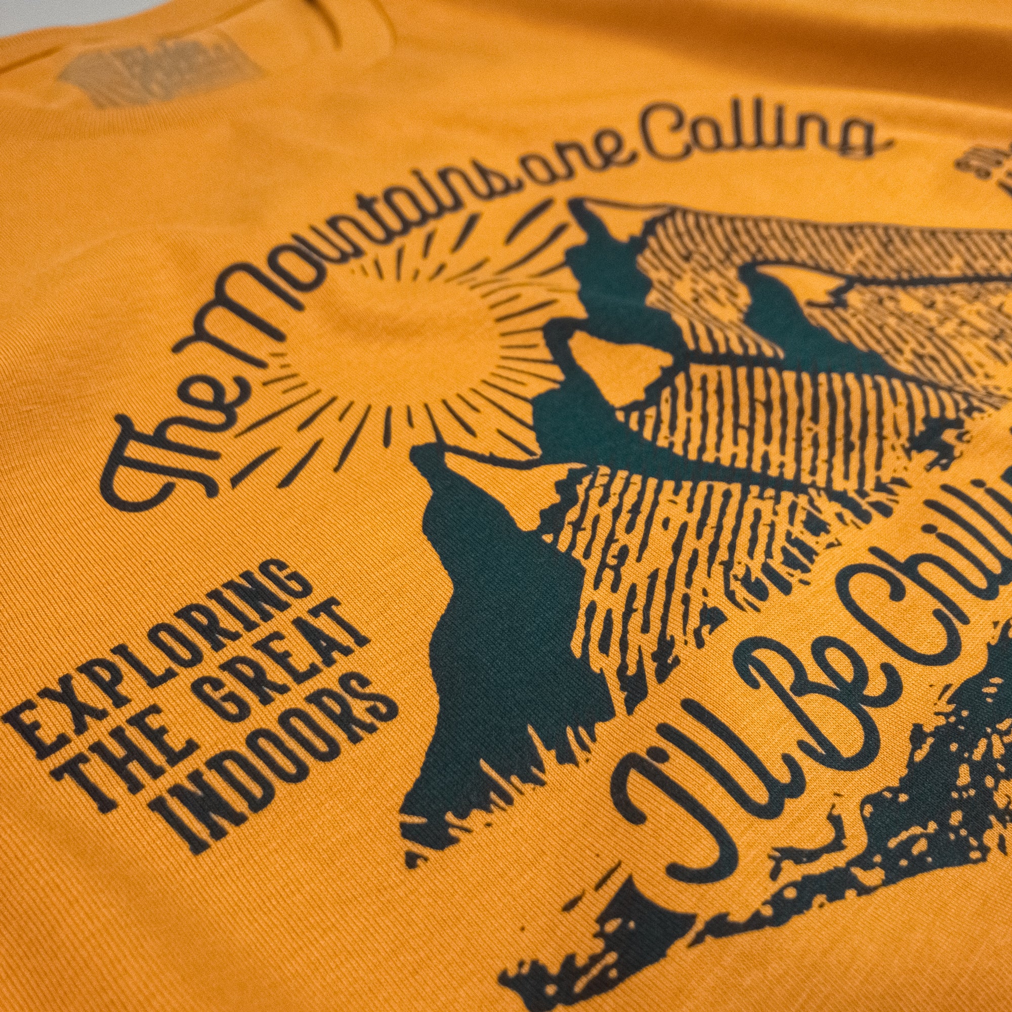 All's Well Originals Mountains mens/unisex Roasted Orange t-shirt hand printed 100% organic cotton t-shirt